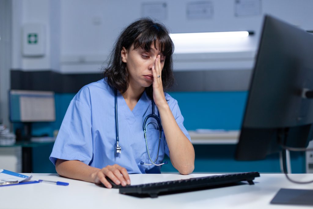 Medical assistant falling asleep while using computer