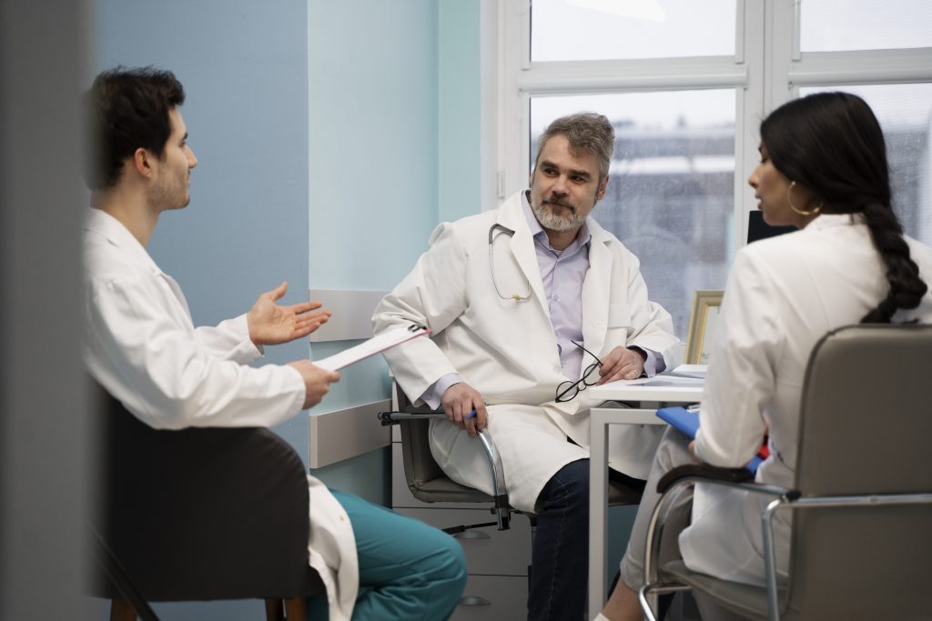 Doctors talking with each other