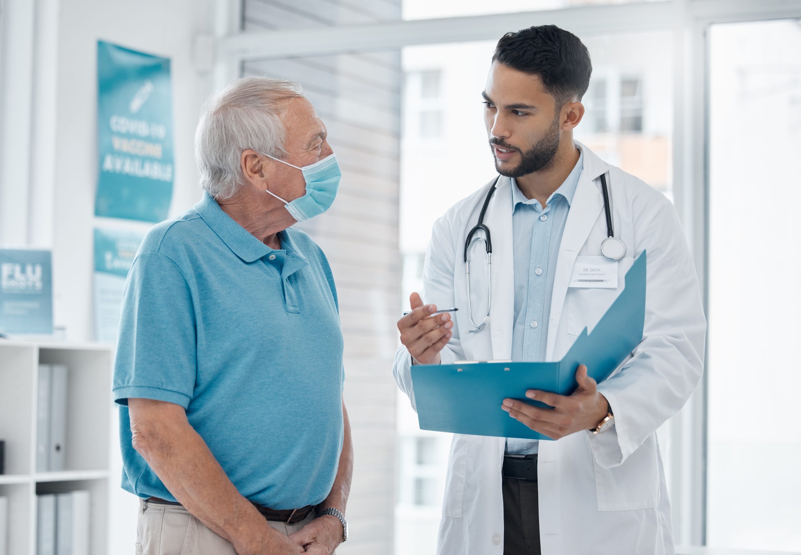 Doctor talking with patient