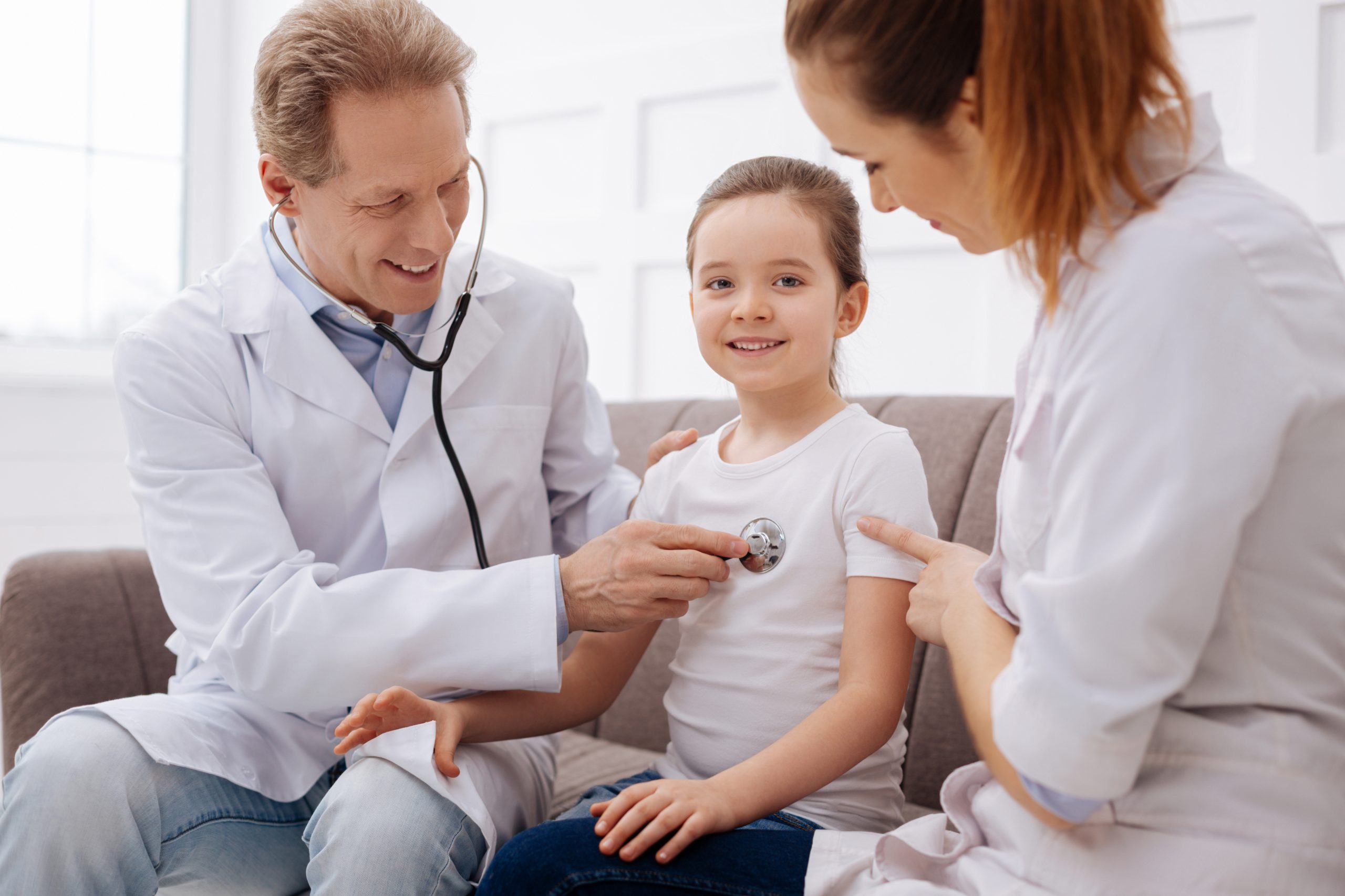 doctors taking care of their little patient