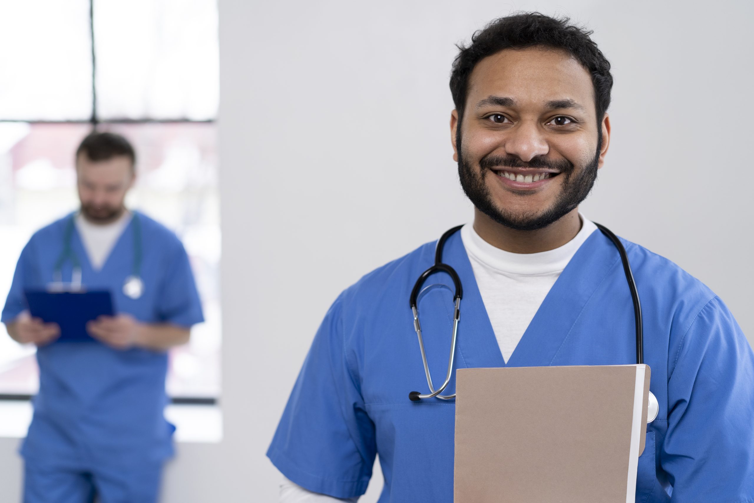 Doctor standing with file